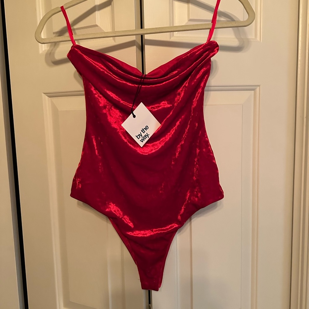 by the way. Vibrant Red body suit
